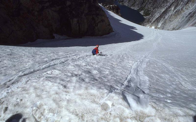 1988-036 Colchuck Pk N Buttress Jul 1988 012 Glissading to Colchuck Lake.jpg
